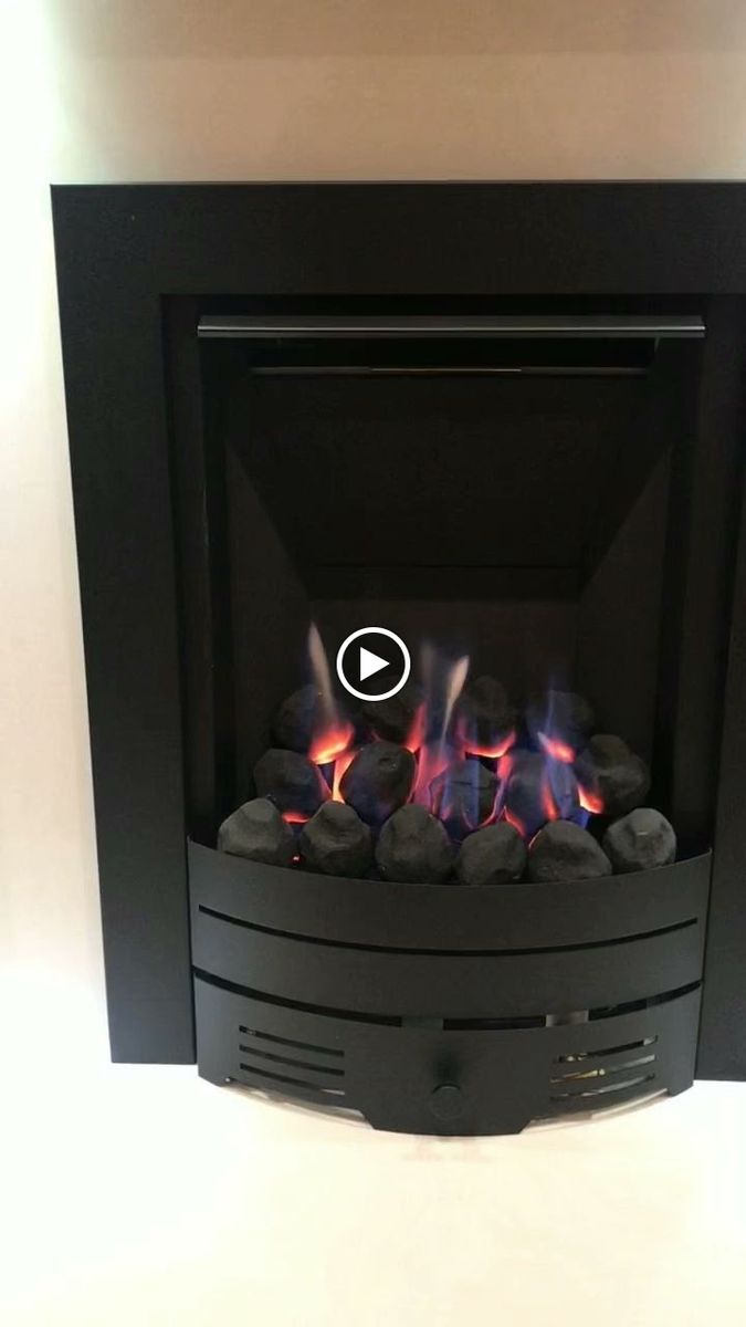 Gas fire installation with flame burning in living room